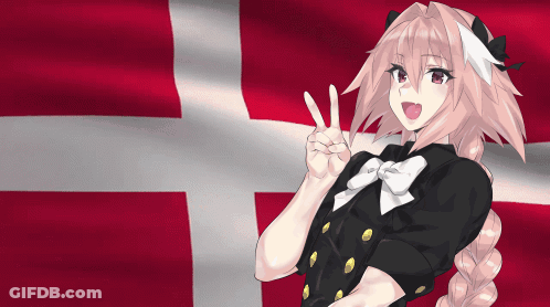 A Girl With Pink Hair Is Giving A Peace Sign In Front Of A Flag GIF