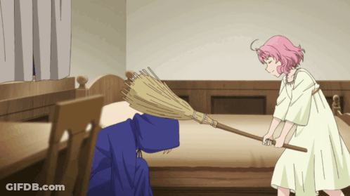 A Girl With Pink Hair Is Holding A Broom In A Bedroom GIF