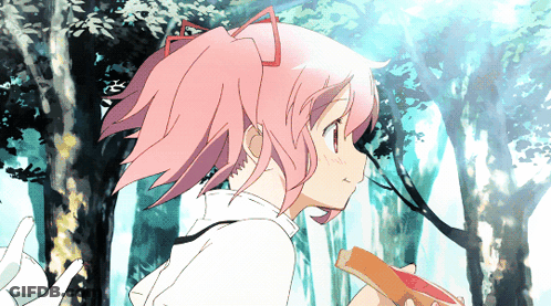 A Girl With Pink Hair Is Holding A Piece Of Bread GIF