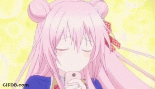 A Girl With Pink Hair Is Holding A Pink Phone In Her Hand GIF