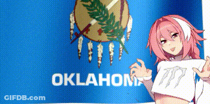 A Girl With Pink Hair Is Holding A Sign In Front Of A Oklahoma State Flag . GIF