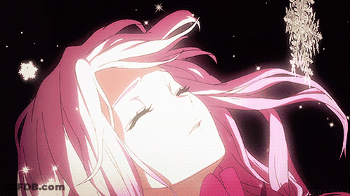 A Girl With Pink Hair Is Laying Down With A Snowflake Hanging From Her Hair GIF