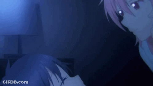 A Girl With Pink Hair Is Laying On A Bed With Her Eyes Closed And A Man Holding Her Hair . GIF