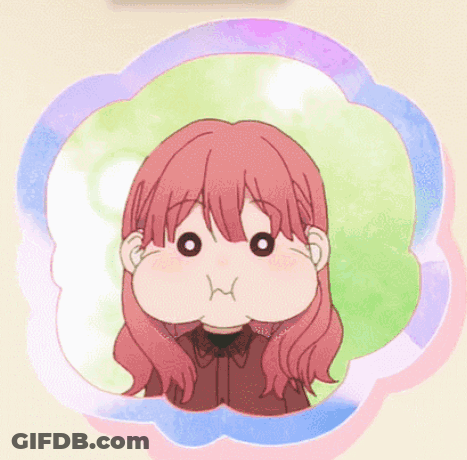 A Girl With Pink Hair Is Making A Funny Face GIF