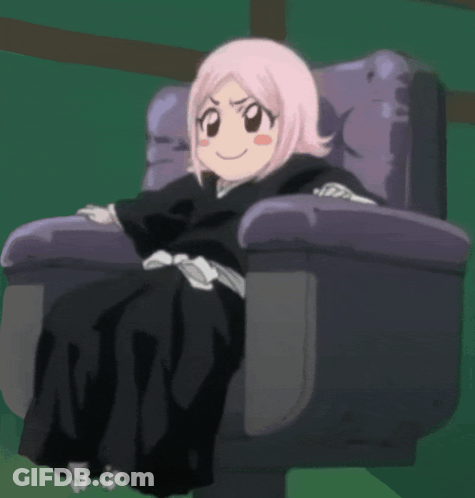 A Girl With Pink Hair Is Sitting In A Purple Chair GIF