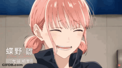 A Girl With Pink Hair Is Smiling With Chinese Writing On The Bottom GIF