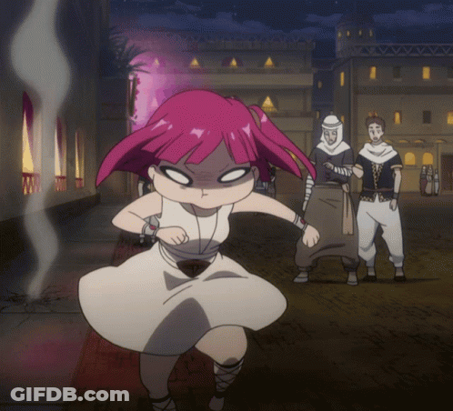 A Girl With Pink Hair Is Standing In Front Of A Building GIF