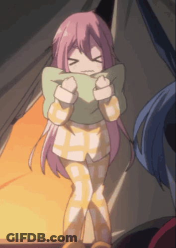 A Girl With Pink Hair Is Standing In Front Of A Tent Holding A Pillow GIF
