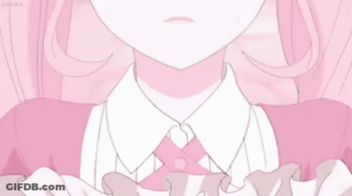 A Girl With Pink Hair Is Wearing A Pink Dress And A White Shirt . GIF