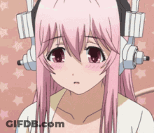 A Girl With Pink Hair Is Wearing Headphones And A White Shirt GIF