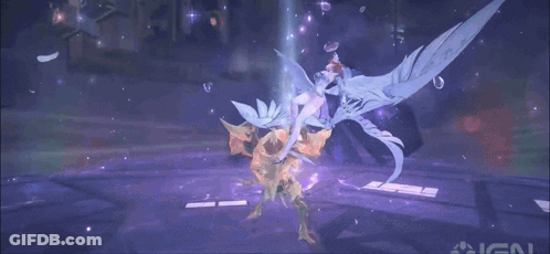 A Girl With Pink Hair Is Wrapped In A Blanket With The Ign Logo In The Background GIF