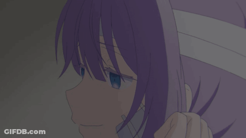 A Girl With Purple Hair And Blue Eyes Has A Bandage Around Her Head GIF