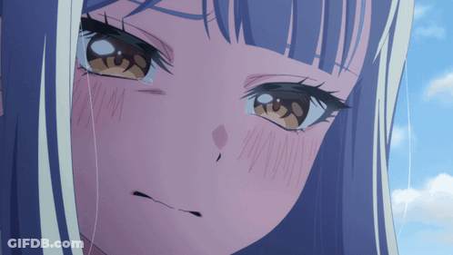 A Girl With Purple Hair And Brown Eyes Is Crying GIF