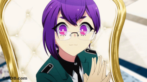 A Girl With Purple Hair And Glasses Is Sitting On A Chair GIF