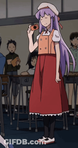 A Girl With Purple Hair Is Holding A Camera GIF