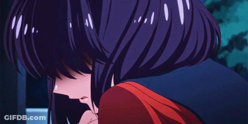 A Girl With Purple Hair Is Hugging Another Girl In A Red Shirt GIF