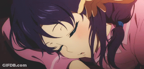 A Girl With Purple Hair Is Laying On A Pink Blanket With Her Eyes Closed GIF