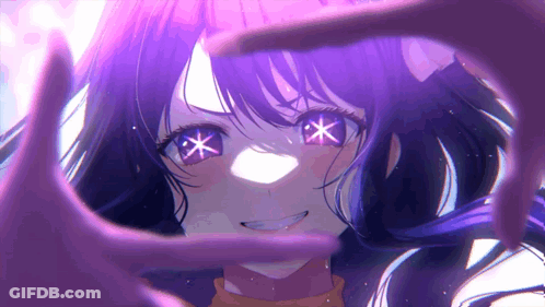 A Girl With Purple Hair Is Smiling And Making A Heart Shape With Her Hands GIF
