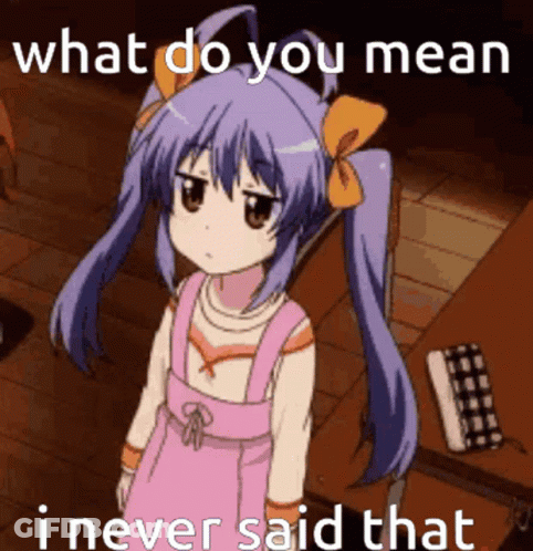 A Girl With Purple Hair Is Standing In Front Of A Table With The Words What Do You Mean I Never Said That GIF