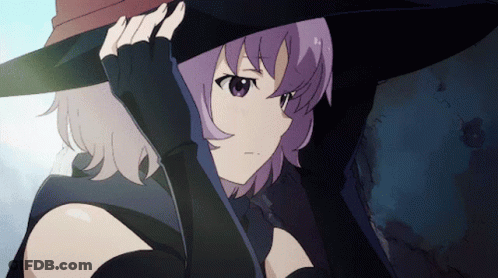 A Girl With Purple Hair Is Wearing A Black Hat GIF