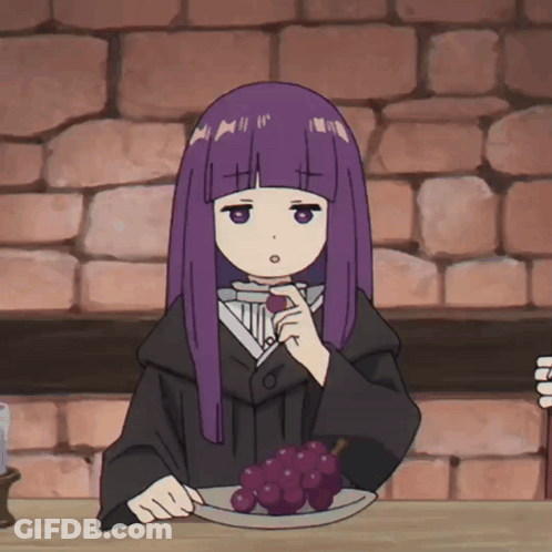 A Girl With Purple Hair Sits At A Table With A Plate Of Grapes On It GIF