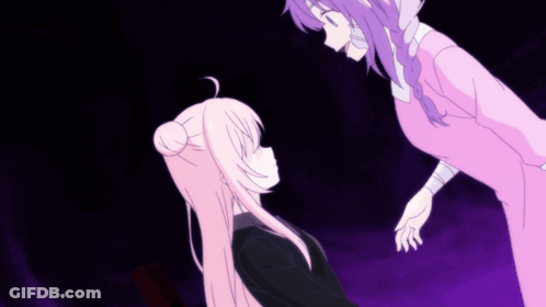 A Girl With Purple Hair Stands Next To A Girl With Pink Hair GIF