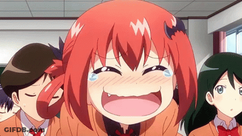 A Girl With Red Hair And A Bat On Her Head Is Laughing And Crying In A Classroom . GIF