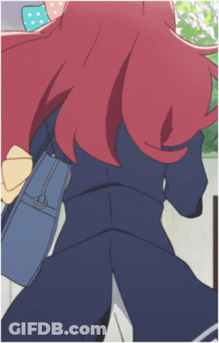 A Girl With Red Hair And A Blue Purse GIF