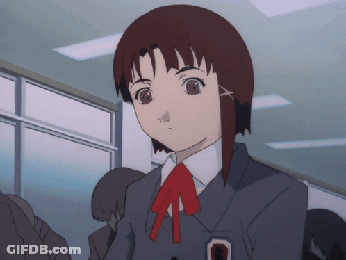 A Girl With Red Hair And A Red Bow Tie Has A Badge With A Circle On It GIF