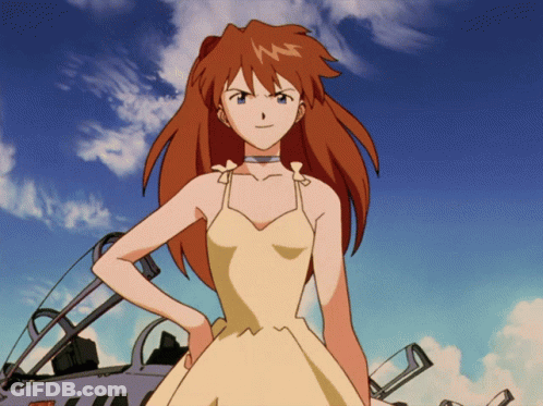 Girl With Red Hair And Yellow Dress GIF