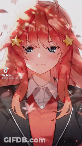 A Girl With Red Hair And Blue Eyes Has A Star On Her Hair GIF