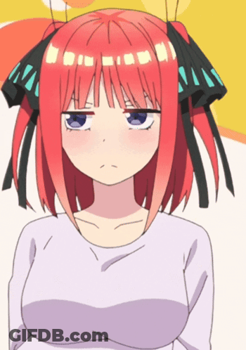 A Girl With Red Hair And Blue Eyes Is Making A Face GIF