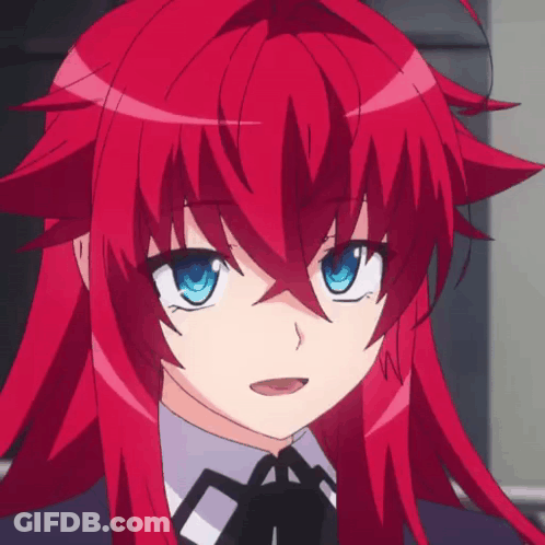 A Girl With Red Hair And Blue Eyes Is Wearing A Bow Tie GIF