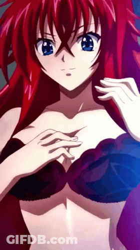 A Girl With Red Hair And Blue Eyes Is Wearing A Bra GIF