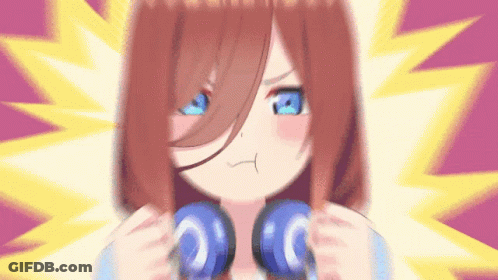 A Girl With Red Hair And Blue Eyes Is Wearing Blue Headphones GIF