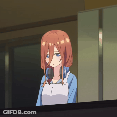 A Girl With Red Hair And Blue Eyes Is Wearing Headphones And A White Apron GIF