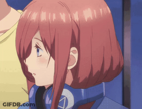 A Girl With Red Hair And Blue Eyes Is Wearing Headphones With The Letter A On It GIF