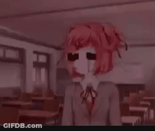 A Girl With Red Hair And Glasses Is Standing In A Classroom With A Bloody Face . GIF