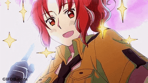 A Girl With Red Hair And Green Eyes Is Holding A Knife In Her Hand . GIF