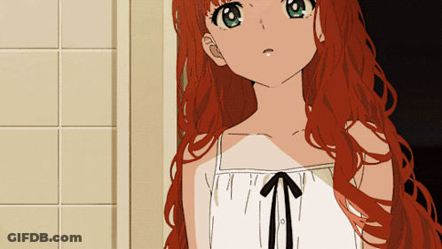 A Girl With Red Hair And Green Eyes Is Wearing A White Dress With A Black Bow GIF
