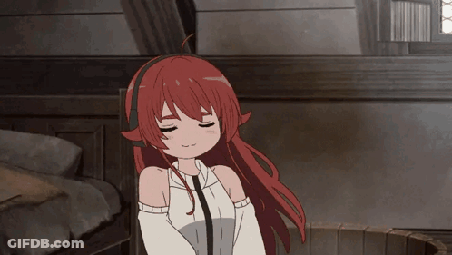 A Girl With Red Hair And Headphones On Her Head GIF