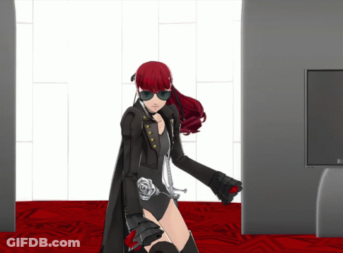 A Girl With Red Hair And Sunglasses Stands In A Room GIF