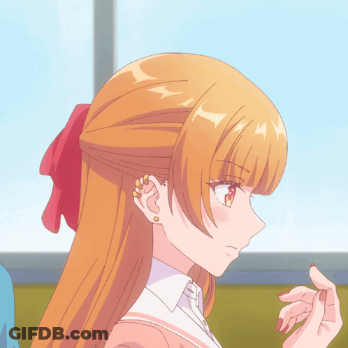 A Girl With Red Hair Has A Red Bow In Her Hair GIF