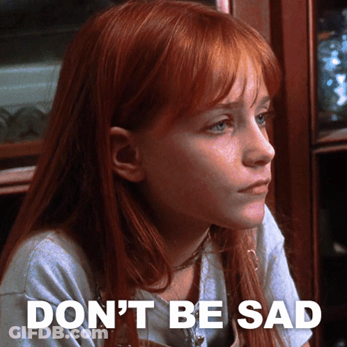A Girl With Red Hair Has The Words " Do N't Be Sad " On The Bottom GIF