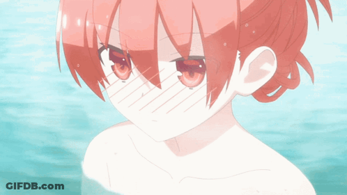 A Girl With Red Hair Is Covering Her Face With Her Hands GIF