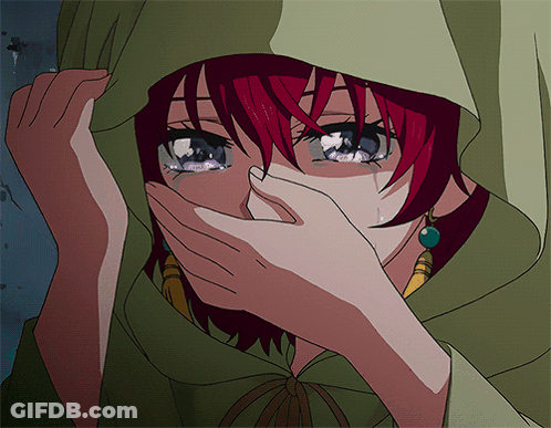 A Girl With Red Hair Is Covering Her Mouth With Her Hand GIF
