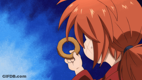 A Girl With Red Hair Is Eating A Donut With A Blue Sky In The Background GIF