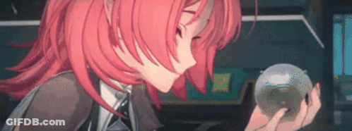 A Girl With Red Hair Is Holding A Clear Ball In Her Hands . GIF