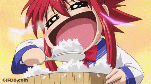 A Girl With Red Hair Is Holding A Spoon In Her Mouth And Eating Rice . GIF