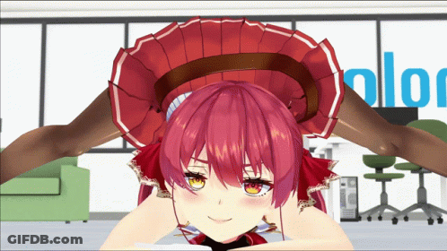 A Girl With Red Hair Is Laying On Her Stomach In Front Of A Blue Sign That Says Color GIF
